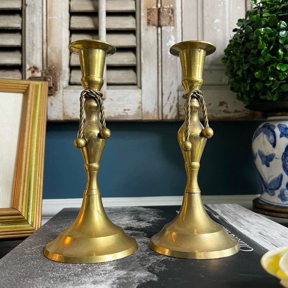 Pair of Vintage Brass Candlestick Holders Adorned With Tied Rope Details.